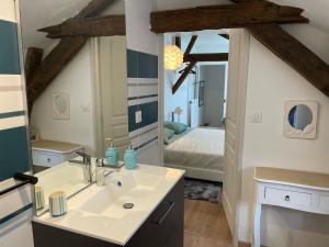 Appartements Au puits de l-abbaye : photos des chambres