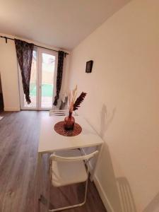 Appartements T2 cosy et calme avec terrasse : photos des chambres