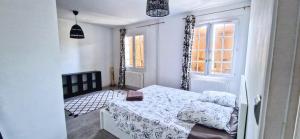 Maisons de vacances Maison Confort, Terrasse & Jardin, Parking : photos des chambres