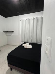 Suite 1- black em Praia bonita hospedagem