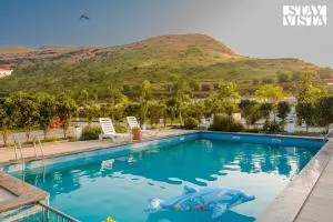 StayVista's Hill Crest Mansion - Hill-View Villa with Private Pool, Deck, Lawn & Gazebo - Saputara