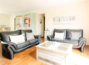 Villas Tres agreable villa avec barbecue : photos des chambres