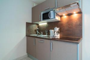 Appartements Les Thermes 421- Appt pour 4 avec piscine partagee : photos des chambres