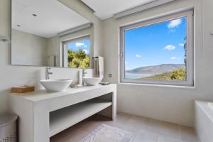 Villa Artemis - New Magnificent Beachfront Villa with Infinity Pool!