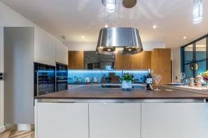 Sejours chez l'habitant SUITE ET CHAMBRES COSY CHEZ A&M -ELEGANT HOME, CALME, CAMPAGNE, PARKING gratuit : photos des chambres