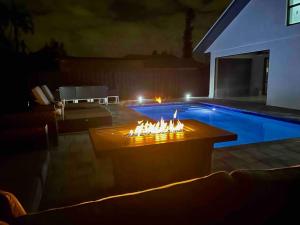 Luxe Pool Home minutes from the beach!