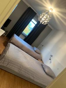 Twin Room with Private Toilet room in Vandrarhem Tre Knektar Köping