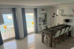 Ruim appartement aan het strand met 4 slaapkamers