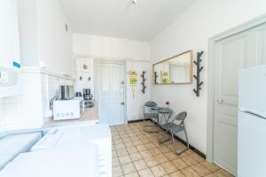 Appartements Le Nerisien - Charmant studio pour 2 : photos des chambres