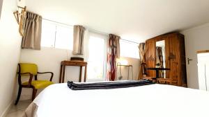 Appartements A la ville comme a la campagne : photos des chambres