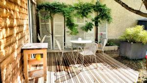 Appartements A la ville comme a la campagne : photos des chambres