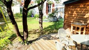 Appartements A la ville comme a la campagne : photos des chambres