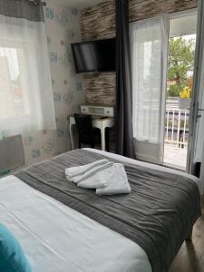 Hotels Au Petit Bonheur : photos des chambres