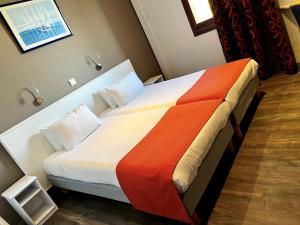 Hotels CitHotel Le Louvre : photos des chambres