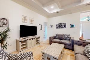 Dog-friendly home with Tesla EV charger, yard, patio, grill, AC, & WD