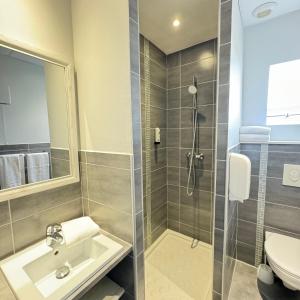 Hotels Cit'Hotel Les Alizes : photos des chambres