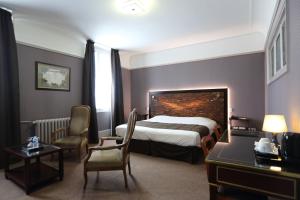 Hotels Le Grand Hotel : photos des chambres