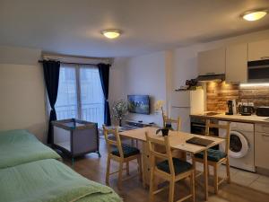 Appartements Studio cosy a 5 minutes de DISNEYLAND PARIS : photos des chambres