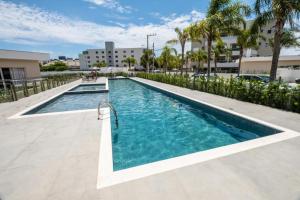 Apartamento moderno individual na praia