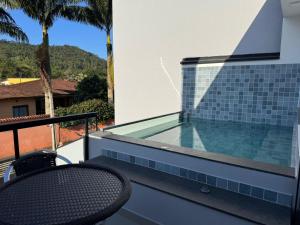 Villa da Serra 2 - Casa com piscinas privativas vidro