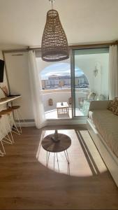Studio cabine climatisé de 20m2 avec place de parking privée