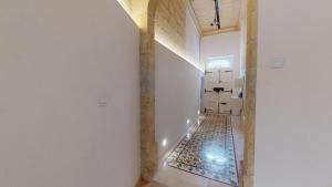 Cosy bedroom in a shared Maltese townhouse