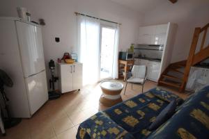 Jolie Maison T3 mezzanine climatisée avec veranda, 4 à 5 couchages, terrasse clôturée, WIFI inclus, Résidence LES MARINES, 200m de la plage LRMA68B