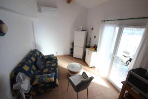 Jolie Maison T3 mezzanine climatisée avec veranda, 4 à 5 couchages, terrasse clôturée, WIFI inclus, Résidence LES MARINES, 200m de la plage LRMA68B