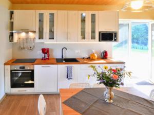 Holiday home with private garden close to the lake