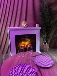Appartements Maison Romantique/Jacuzzi : photos des chambres