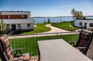 Hangar 19 Luxusapartment mit Sauna, Kamin, Dachterrasse und Seeblick H5W3