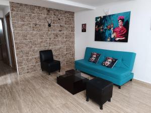 Aparta hotel el rincón de Frida