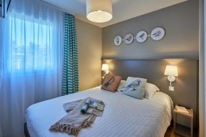 Appart'hotels Pierre & Vacances Residence Le Chant des Oiseaux : photos des chambres