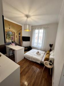 Appartements Appartement proche de PARIS au centre ville tout confort : photos des chambres