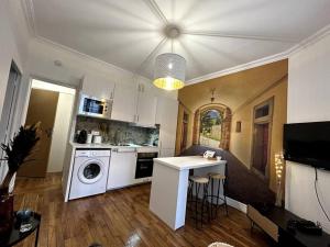 Appartements Appartement proche de PARIS au centre ville tout confort : photos des chambres