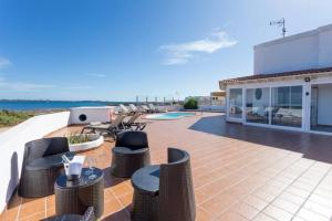 Corralejo Beachfront Villa Remos with Lobos Island View, Private Pool, Wifi & BBQ by Amazzzing Travel