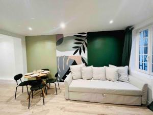 Appartements Les Orchidees : photos des chambres