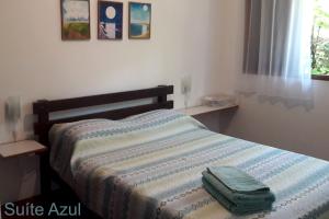 Suítes em casa de família com entrada independente