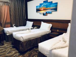 فندق الزائر الأخيار الفندقية