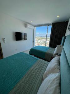 Camino al Mar Apartment with Amazing View of the Ocean, Beach and Swimming Pool