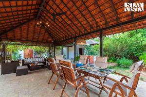 Wander Beyond by StayVista - Featuring a Bali-themed abode and a refreshing swimming pool
