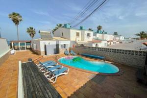 Beachfront Villa San Antonio with Private Heated Pool BBQ in the Heart of Corralejo by Amazzzing Travel