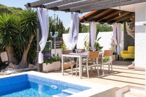 Agustina - Casa adosada en Riumar con jardín, barbacoa y cerca del mar - Deltavacaciones