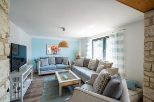 Ferienhaus Landlust - Erholung mit Fasssauna und Whirlpool nahe Binz!