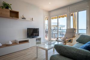 AT036 Vista playa, piscina, primera línea