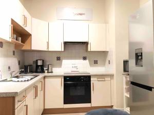 Appartements LE MANOIR - REZ DE CHAUSSEE - PARKING - WIFI - CENTRE VILLE : photos des chambres