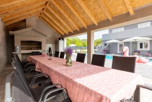 Property with a pool near Trogir with parking, BBQ 