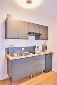 Appartements Studio Cosy : photos des chambres