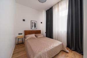 Lienes iela Gem 1BR Apartment with Fireplace in Historic UNESCO Center