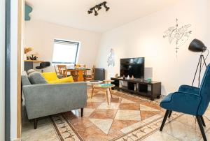 Appartements * * Le Duplex des Cigognes * * : photos des chambres